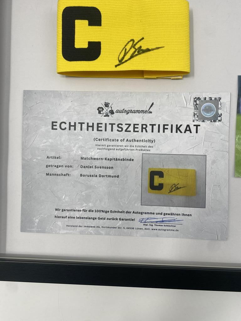 Captain's armband signed by Daniel Svensson as part of the Borussia Dortmund COA