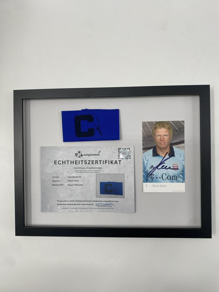 Captain's armband signed by Oliver Kahn in a Bayern Munich autograph COA frame