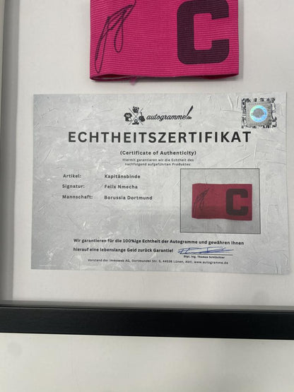 Captain's armband signed by Felix Nmecha as part of the Borussia Dortmund COA