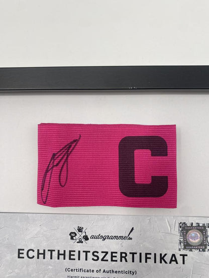 Captain's armband signed by Felix Nmecha as part of the Borussia Dortmund COA