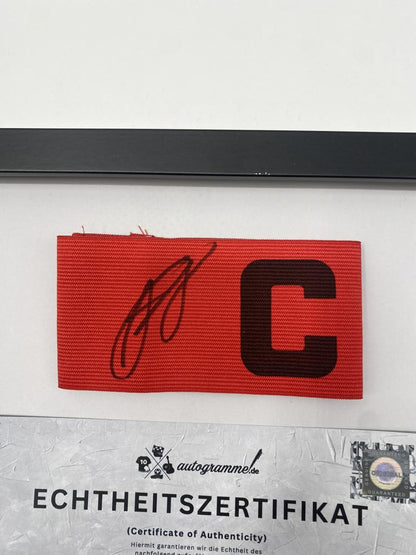 Captain's armband signed by Felix Nmecha as part of the Borussia Dortmund COA