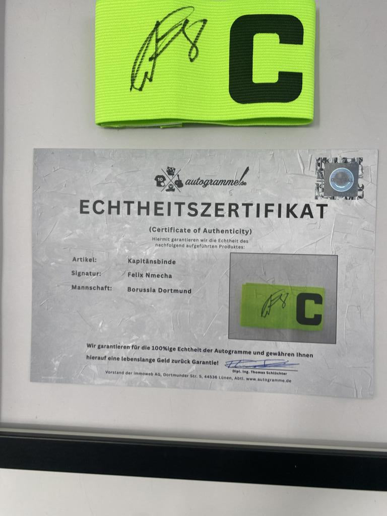 Captain's armband signed by Felix Nmecha as part of the Borussia Dortmund COA