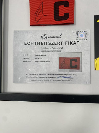 Captain's armband signed by Emre Can in a Borussia Dortmund COA frame