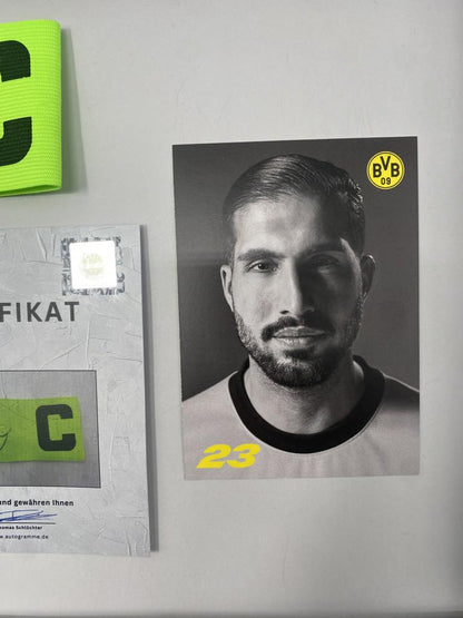 Captain's armband signed by Emre Can in a Borussia Dortmund COA frame